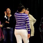 Audience and cast participating in group activities