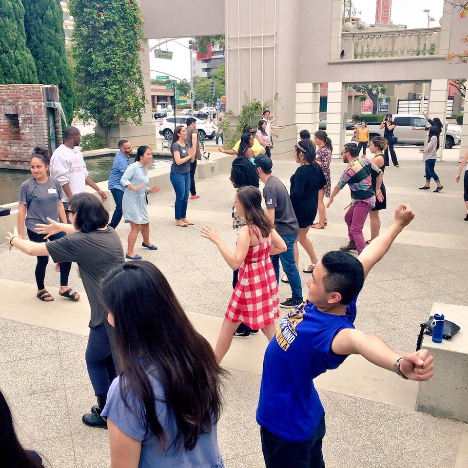 The dancers of Jacob Jonas The Company encouraged all of us to engage in a movement activity that got everyone up on their feet.